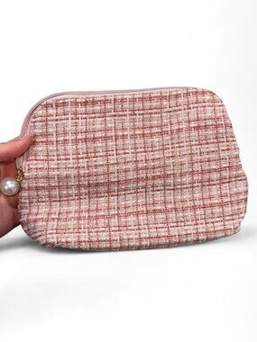 Pink and white tweed makeup bag
